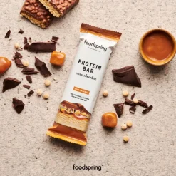 Foodspring Barretta Proteica Extra Cioccolato per Recupero Muscolare Gusto Caramello 45g